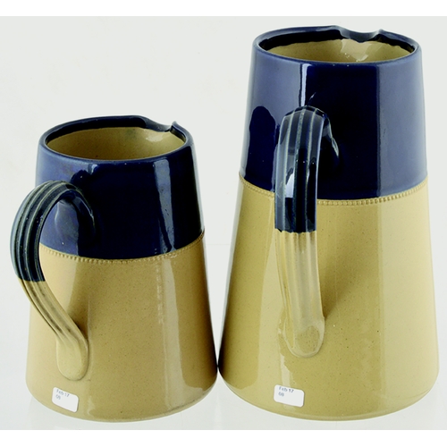 70 - TAYLOR WALKERS BEER JUG DUO. Tallest 8ins, dark blue top, lower tan saltglaze, rear handle, stonewar... 