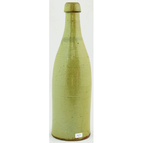 87 - DONCASTER SLAB SEAL PORTER BOTTLE. 12ins tall. Grey/ green c. 1860’s champagne shaped slip glaze bot... 