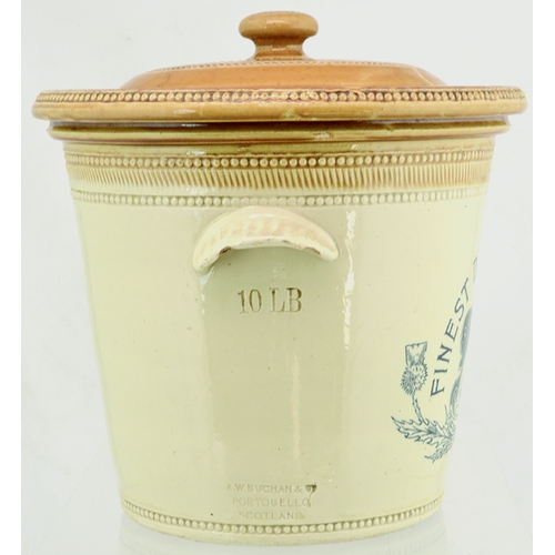 64A - FINEST DAIRY BUTTER BUTTERCROCK. 10.5ins tall to top of lid. Tan top & lid, wheeled decoration, cris... 