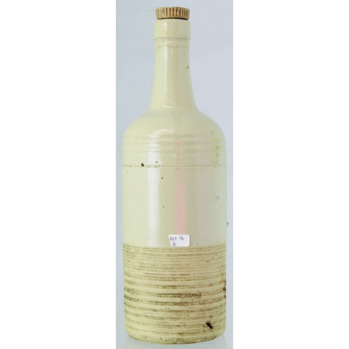 67 - DUNDEE AMMONIA BOTTLE. 11.25ins tall to top of stopper. Off white glaze, horizontal ribbing above & ... 