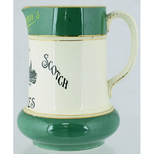 73 - BUCHANANS WHISKY WATER JUG. 6.25ins tall. Late 19th century, Buchanans green top & lower section, wi... 