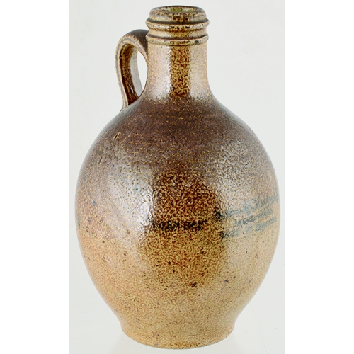 81 - BURY ST EDMUNDS BELLARMINE STYLE FLAGON. 8.75ins tall. Variating brown salt glaze, rear handle. Roya... 