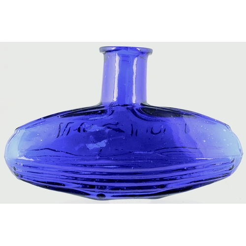 98 - SUBMARINE POISON BOTTLE. (DP pg 24) 2.5ins tall, 4ins long, cobalt blue glass, embossed POISON to fr... 