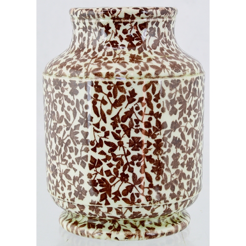 111 - DE LEONS FACILE INHALER. 4.75ins tall. Cream glaze with brown all over body floral decoration, front... 