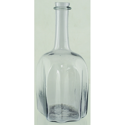 135 - CRUCIFORM DECANTER. 8.7ins tall, thin walled clear flint glass cruciform shape bottle - flat octagon... 