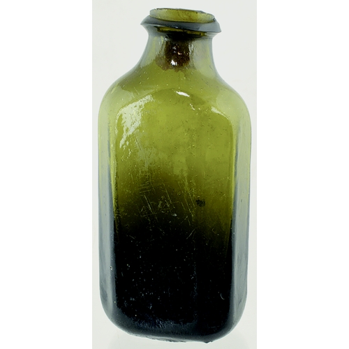 137 - OCTAGONAL UTILITY. 6.75ins tall, very heavy dark green/ black glass rectangular form, chamferred out... 