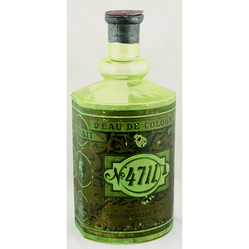 109A - COLOGNE/ PERFUME SHOP WINDOW DISPLAY BOTTLE. 18.5ins tall. Giant lime green uranium coloured glass, ... 