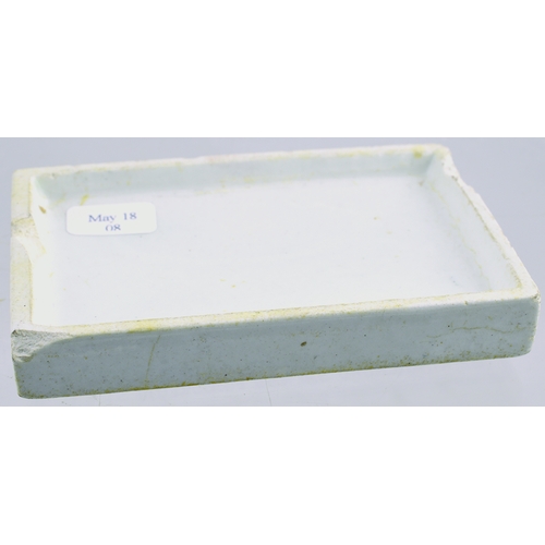 518 - AROMATIC TOOTH PASTE POT LID. (APL p 362, 17) 3.5 by 2.25ins. Rectangular shape pot lid, white glaze... 