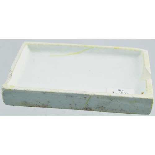 518 - AROMATIC TOOTH PASTE POT LID. (APL p 362, 17) 3.5 by 2.25ins. Rectangular shape pot lid, white glaze... 