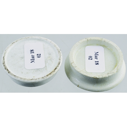 520 - MINIATURE CHERRY TOOTH PASTE POT LID & BASE. (APL p 304, 63a) 1.25ins diam. White glaze, central bla... 