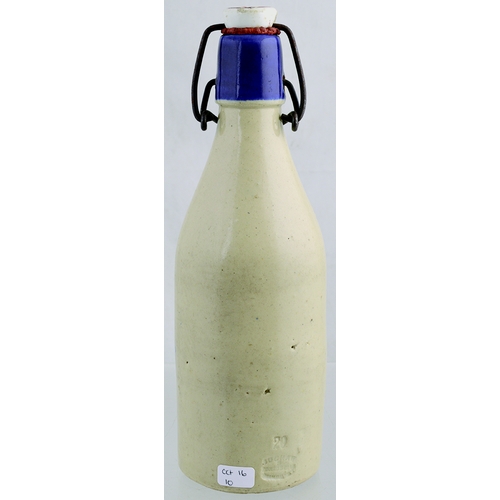 532 - BUCKIE GINGER BEER BOTTLE. 9ins tall. All white, ch, original s.s, blue lip & transfer .../ W & J CR... 