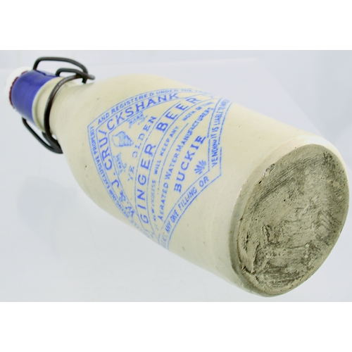 532 - BUCKIE GINGER BEER BOTTLE. 9ins tall. All white, ch, original s.s, blue lip & transfer .../ W & J CR... 