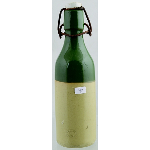 537 - SIDMOUTH GINGER BEER BOTTLE. 9ins tall. Green top, shouldered ch, shape, original s.s, black transfe... 