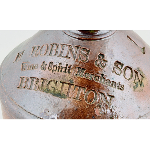 547 - BRIGHTON ONE GALLON FLAGON. 13.5ins tall. Very crude with lots of inmanufacture character! T.t, tan ... 