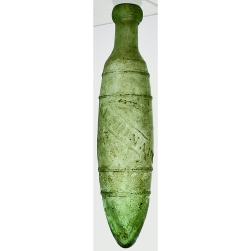 552 - SOYERS LEMONADE BOTTLE. 10ins long. Aqua glass pointed base cylinder with four raised rings to body.... 