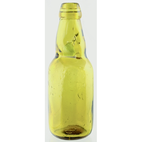 556 - EXETER EARLY SLIM NECK CODD BOTTLE. 8ins tall. Golden amber glass , 2 neck retaining lugs, embossed ... 