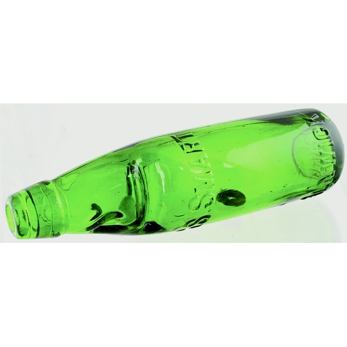 559 - ALNWICK GREEN CODD BOTTLE. 9.5ins tall. Bright green glass codd. Embossed as previous lot - this a b... 