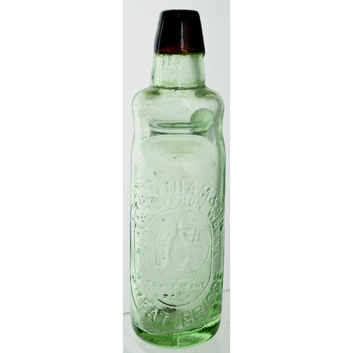 562 - BULB NECK PATENT CODD BOTTLE. 9ins tall. Aqua glass, dark amber lip (). Embossed J. TRENTHAM & SON/ ... 