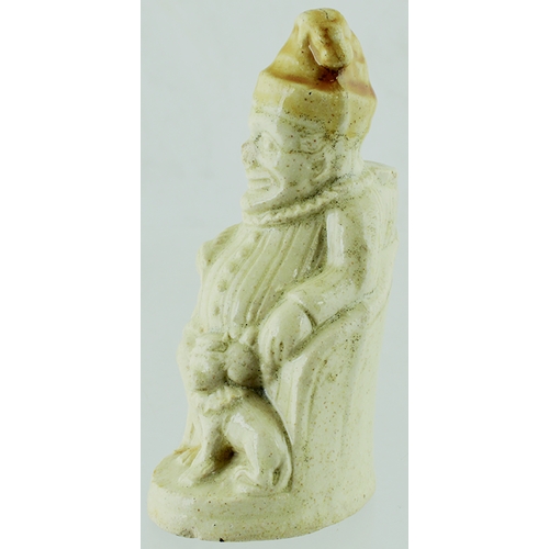 584 - MR PUNCH FIGURAL INKWELL. 5 ins tall. Off white glaze with light tan hat. Shaped as a seated Mr Punc... 