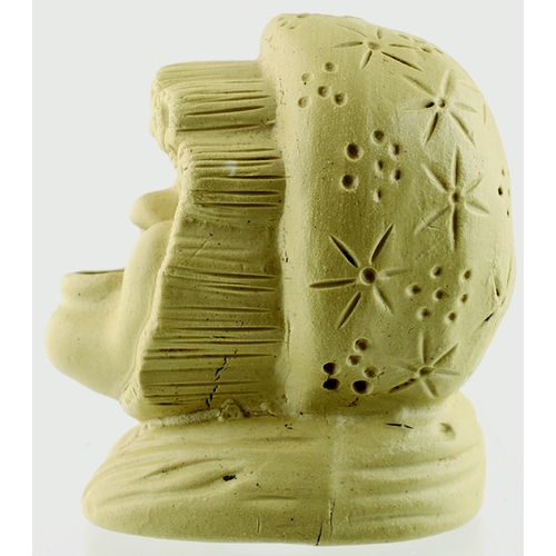 589 - UGLY WOMAN INK. 2.75ins tall. All over tan stoneware ink, in form of an ugly, bonnetted woman with g... 