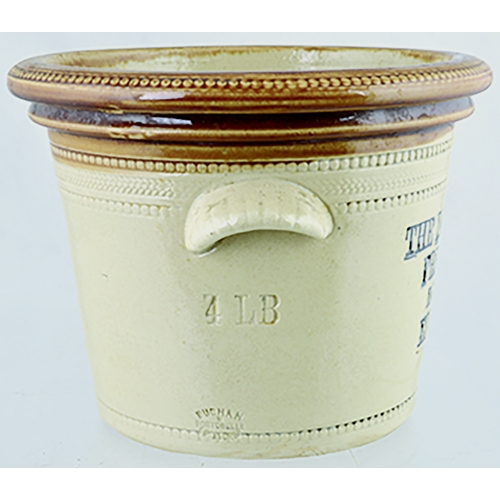 611 - EDINBURGH DANISH DAIRY BUTTERCROCK. 6ins tall. Tan top, lower off white glaze, wheeled decoration ar... 