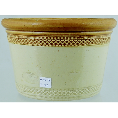 613 - HELENSBURGH BUTTERCROCK. 5ins tall. Light tan top, lower off white glaze, wheeled decoration above &... 