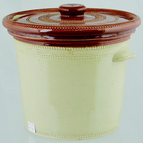 614 - BUTTERCUP DAIRY BUTTERCROCK. 8ins tall to top of lid. Tan top & lid, lower off white glaze, wheeled ... 