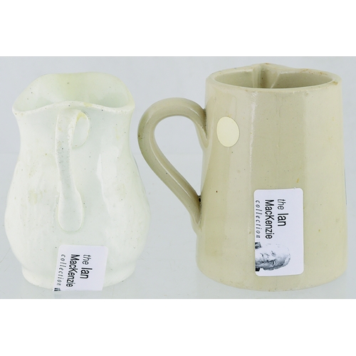 626 - BLEACH JUG DUO. 3.5ins tall. 1. All white shapely moulded handled jug black belly transfer PARAZONE/... 