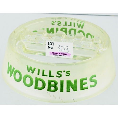 303 - WILLS WOODBINE GLASS ASHTRAY. 5.5ins diam, clear/ frosted glass, green lettering WILLS’S WOODBINES. ... 