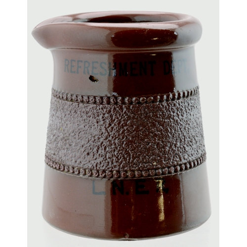 312 - L.N.E.R CREAM POT. 3ins tall, treacle colour black lettering REFRESHMENT DEPT, side spout. Bourne De... 