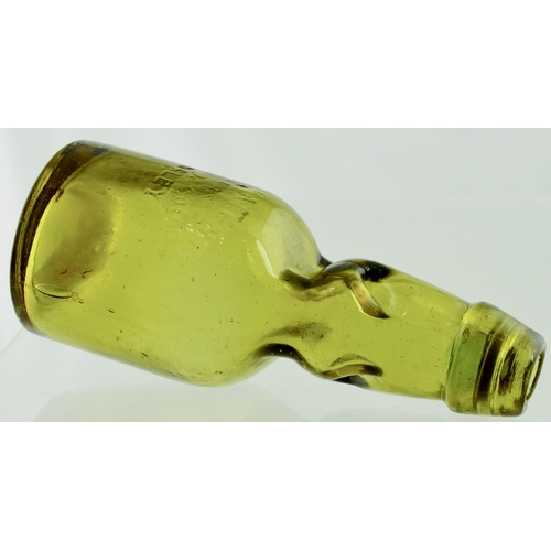 558 - SPLIT SIZE CODDS PATENT 4 BOTTLE. 6ins tall. Light amber glass, 2 neck retaining lugs. Embossed CODD... 