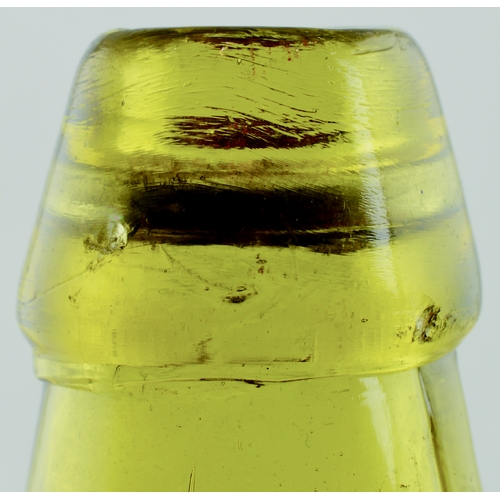 558 - SPLIT SIZE CODDS PATENT 4 BOTTLE. 6ins tall. Light amber glass, 2 neck retaining lugs. Embossed CODD... 