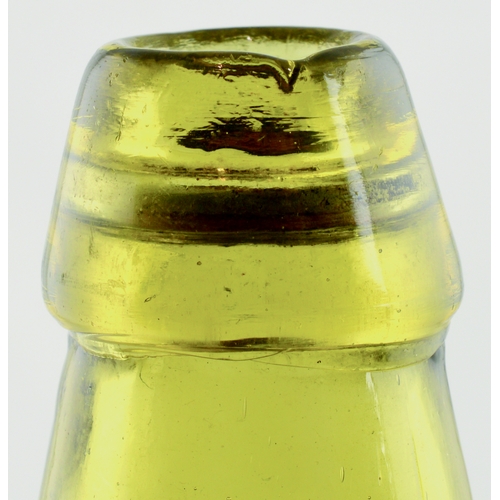 558 - SPLIT SIZE CODDS PATENT 4 BOTTLE. 6ins tall. Light amber glass, 2 neck retaining lugs. Embossed CODD... 