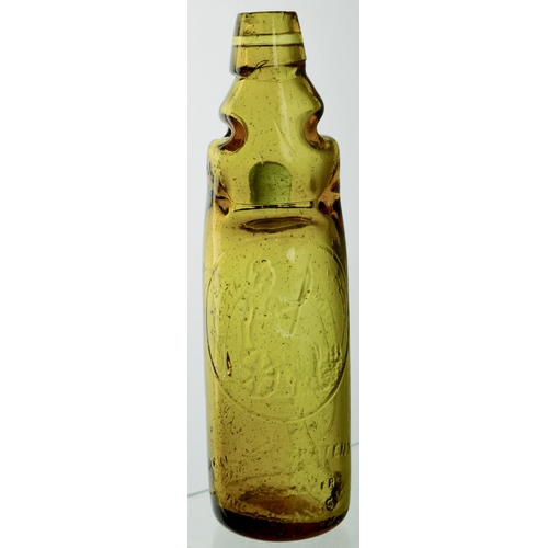 562 - S. HANTS RELIANCE PATENT CODD BOTTLE. 9ins tall. Amber glass 10oz codd bottle, 2 neck retaining lugs... 