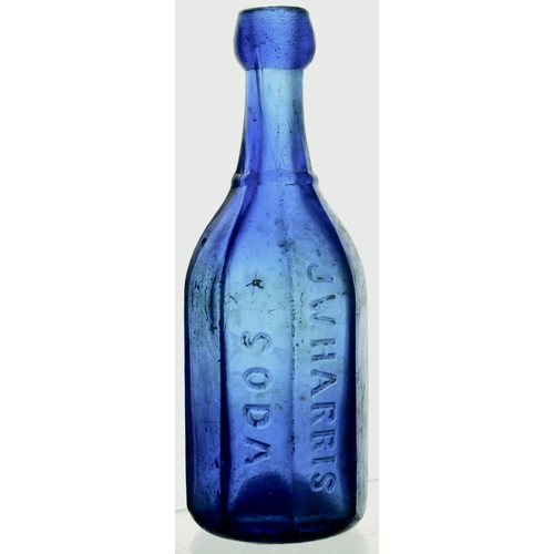 570 - AMERICAN SODA WATER BOTTLE. 7.5ins tall. Cobalt blue glass, facetted body, long neck, chunky/ blob l... 