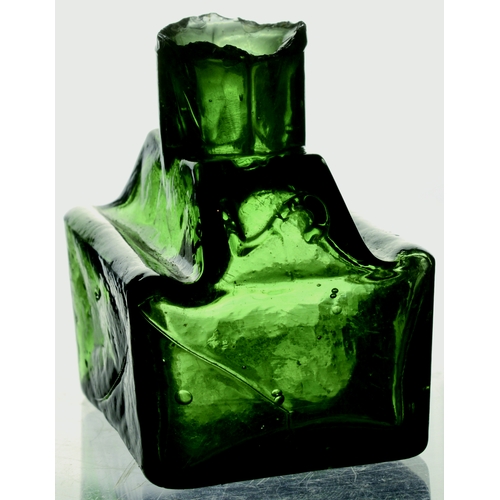 575 - BOAT INK. 2ins tall. Dark green glass boat shape ink, sheared lip with the number 2 embossed backwar... 