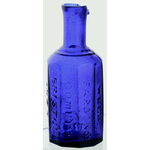 582 - HYDE DECANTER. 8.25ins tall. Cobalt blue, facetted body, embossed HYDE/ 61 FLEET ST/ LONDON. Inner l... 