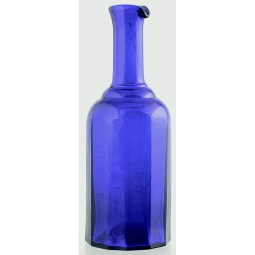 583 - BRISTOL DECANTER.5.25ins. tall. Cobalt blue, facetted body, embossed  WEBB/ FARDON &/ COMPY’S/ BRIST... 