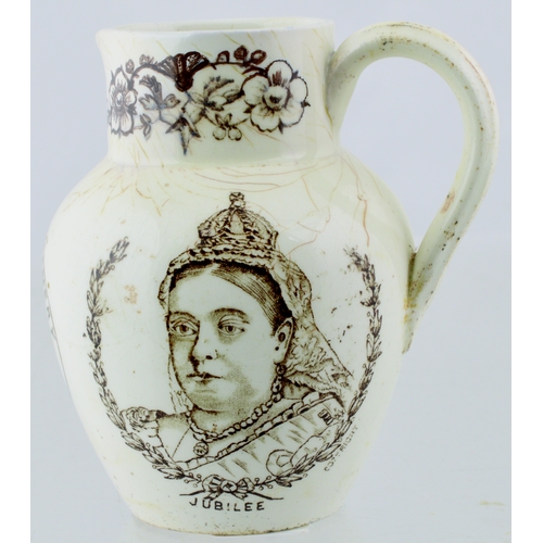 587 - MANCHESTER CREAM JUG. 3.5ins tall. Sepia transfer, rear handle, portraits of Queen Victoria either s... 