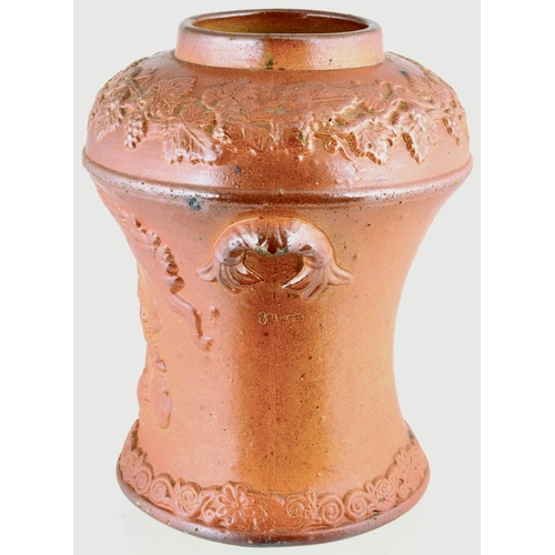 611 - EARLY TOBACCO JAR. 10.5ins tall. Warm mid variating brown salt glaze. Sprigged mouldings all round i... 