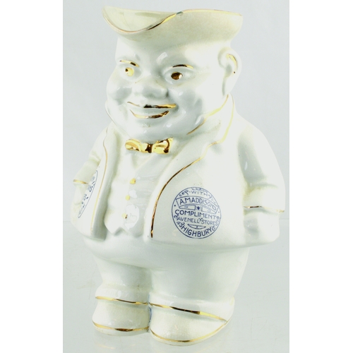 620 - MANN GROSSMANS BEER JUG. 8.5ins tall. Off white glaze, figural jug of a portly gent, gold highlights... 