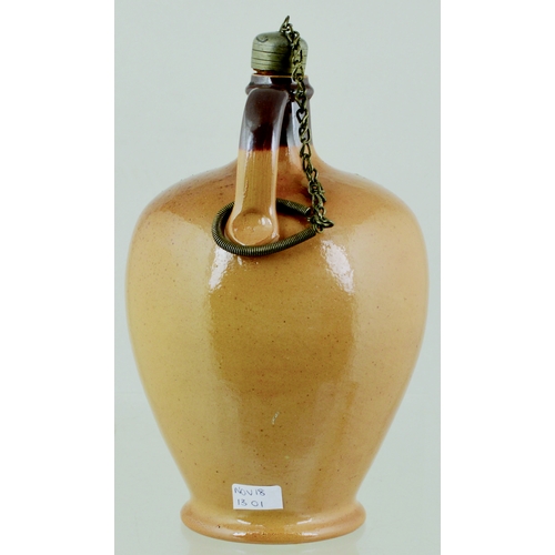 628 - JOHN ROBERTSON & SON WHISKY JUG. (WG p 157) 8.5ins tall. All tan glaze, darker top & handle, raised ... 