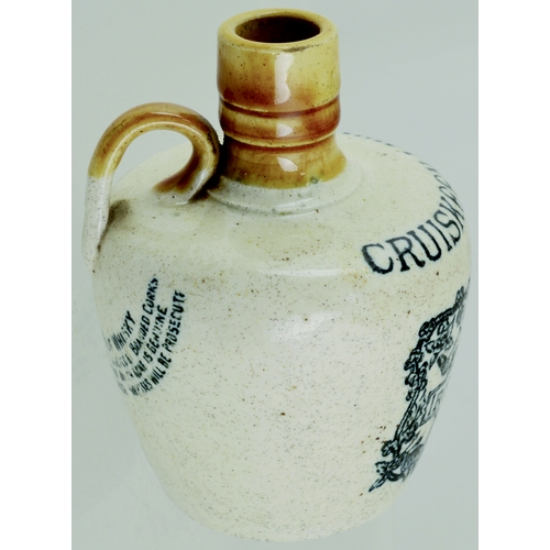 630 - CRUISKEEN LAWN WHISKY JUG. (WG p 135) 4.5ins tall. Tan neck & rear handle, strong black transfer for... 