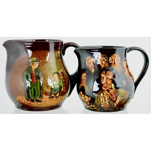 641 - KINGSWARE JUG DUO. Tallest 5ins. Rear handles, one with image The Artful Doger & Oliver Twist & othe... 