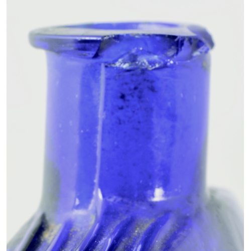 675 - SUBMARINE POISON BOTTLE. (DP p 24) 2.5ins tall. Cobalt blue glass, embossed POISON to front REGISTER... 