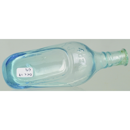 676 - QUINES POISON BOTTLE. (DP p 34) 5.75ins long. Ice blue glass, embossed POISON either side neck area ... 