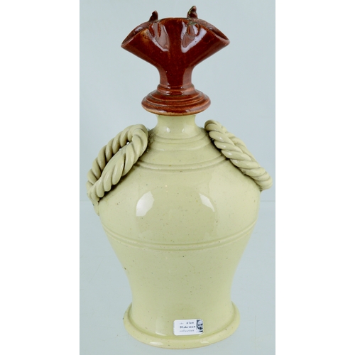 715 - BRISTOL MONEY BOX. 8ins tall, Bristol cream glazed bell shape, small foot rim. Red brown top with 2 ... 