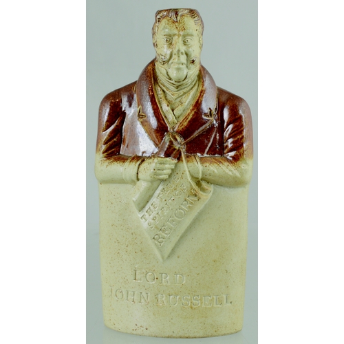 723 - LORD JOHN RUSSELL REFORM FLASK. (Reform Flasks, AB p 38) 7.25ins tall. T.t, salt glaze flask formed ... 