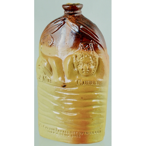 727 - MR & MRS CAUDLE FLASK. (Reform Flasks, p 16) 7.75ins tall, brown top, lower tan salt glaze, round sh... 