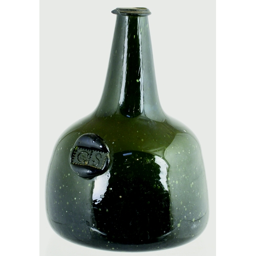 729 - SEALED MALLET WINE BOTTLE. 8ins tall. Very dark green glass, full of tiny seed bubbles, long taperin... 